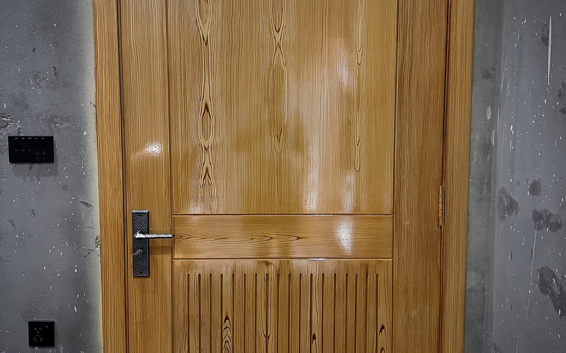 Wooden door made and fitted in Okara.
